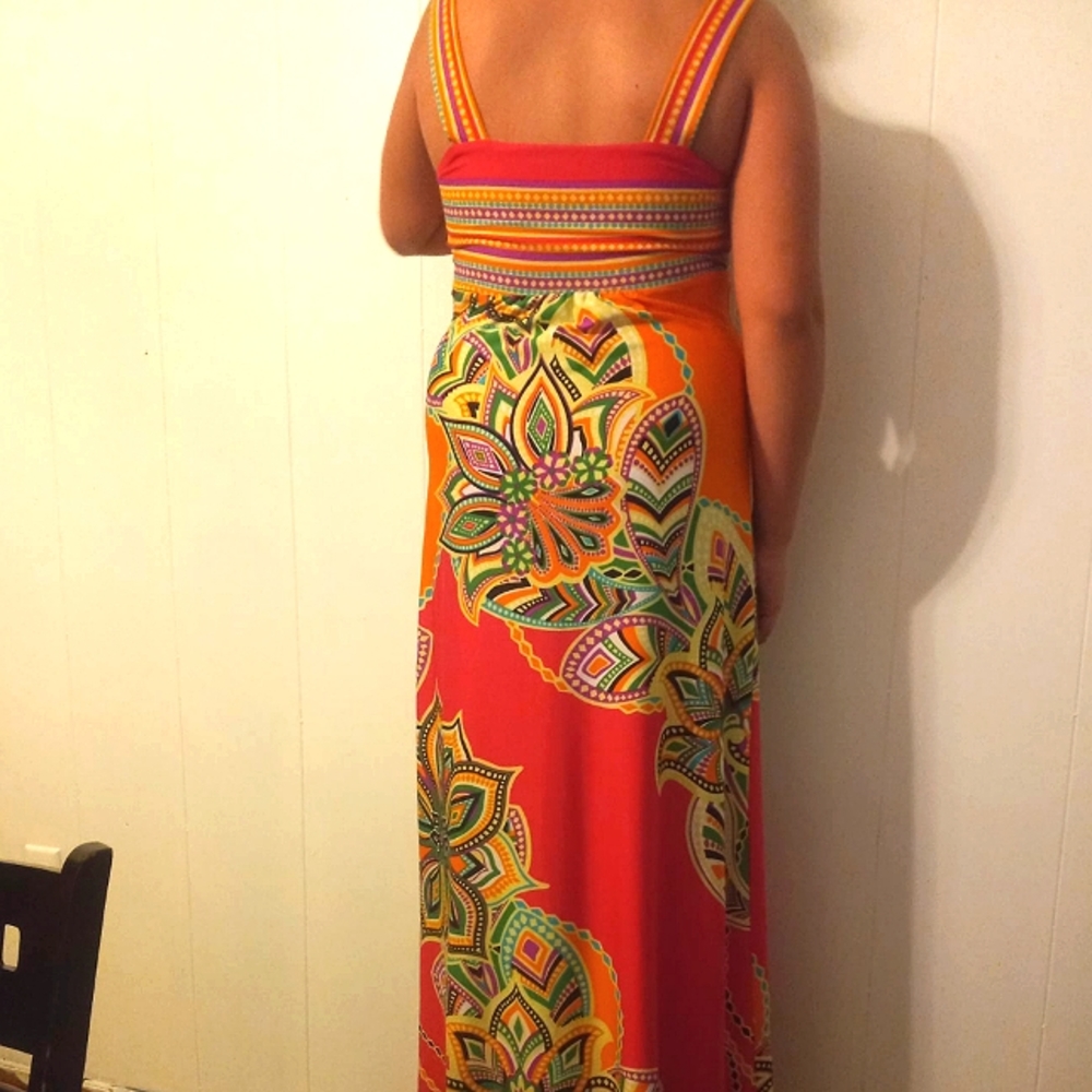 A orange dress with other colors included